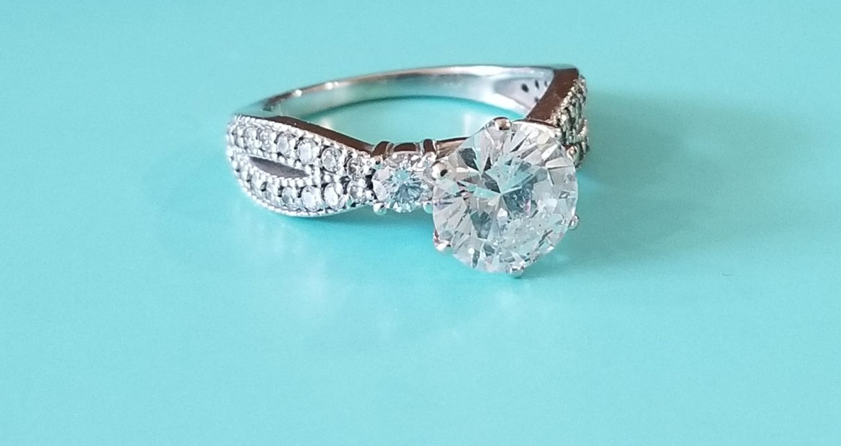 Side Stone Engagement Ring